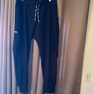 Woman’s Medcouture black jogger scrub pants. Size large